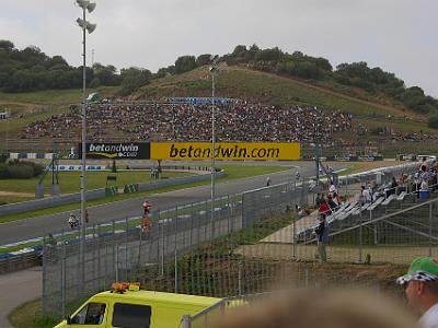 Saturday 25 March, 2006  We found our way to seating area XO, right on Curva Alex Criville, turn 11. We can see the bikes coming around turn 10 Curva Peluqui.