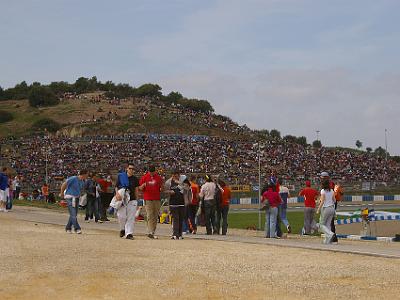 Saturday 25 March, 2006  Continuing our walk around the perimeter. Note how quickly the stands are filling.