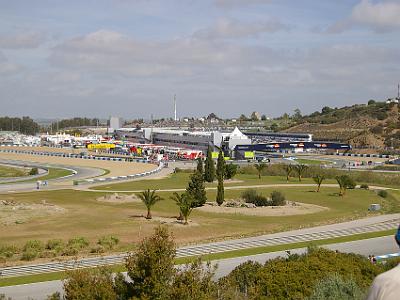 Saturday 25 March, 2006  Looking across to turn 7.   Just prior to the Repsol signs, is Curva Lorenzo, turn 13.