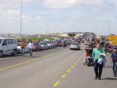 Saturday 25 March, 2006  Cars were stopped everywhere while the bikes proceeded to the front and blocked the roads into the circuit.