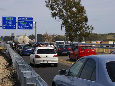 Saturday 25 March, 2006  Bikes continue to push past the cars to the head of the queue.