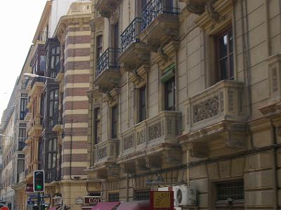 Saturday 1 April, 2006  The buildings in one of the city streets of Granada. This one features iron lacework balconies.