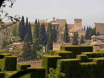 Sunday 2 April, 2006  From the Generalife looking down into the Alhambra. Some of  the 13 towers are visible. The large square castellated tower in the right distance is the Tower of Comares and the Nazaries Palaces are in the right centre.