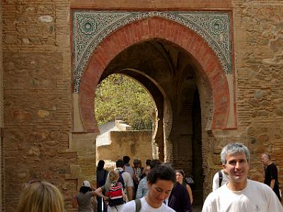 Sunday 2 April, 2006  The Puerta del Vino (Wine gate). The exterior façade of the gate has a pointed horseshoe arch and embossed voussoirs.  It leads to the Square of the Cisterns.