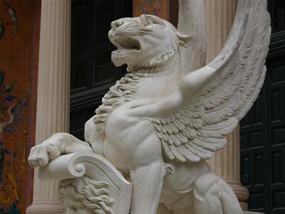 Wednesday 5 April, 2006  Winged lion at the entrance of the Palacio de Velázquez.  It is now used for various exhibitions, some of which are put on by the Reina Sofía Museum.