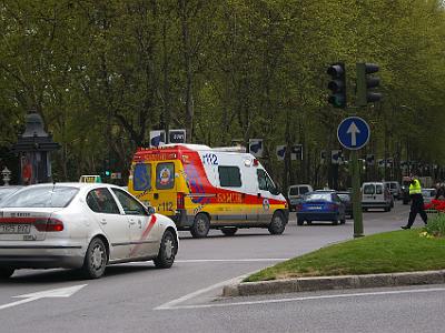 Friday 7 April, 2006  Small crisis as a Policeman stops the traffic so that an ambulance can reach the kerb.