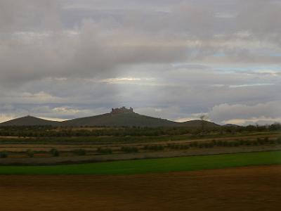 Thursday 23 March, 2006  A castle appears  on the hill outside our window - we're in La Mancha territory