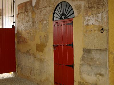 Thursday 23 March, 2006  Where the bulls are kept prior to the bout. The red door to the left opens so that they can enter the arena.