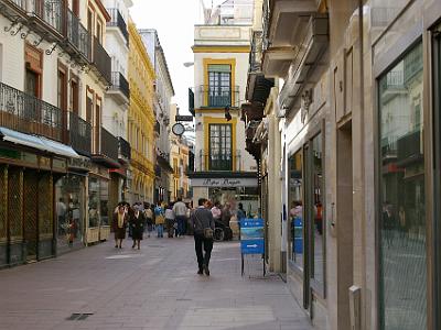 Sunday 26 March, 2006  Calle Sierpes has lots of upmarket shops - closed at this time of day, 12:15 according to the clock in the picture. Could also be because it's Sunday.