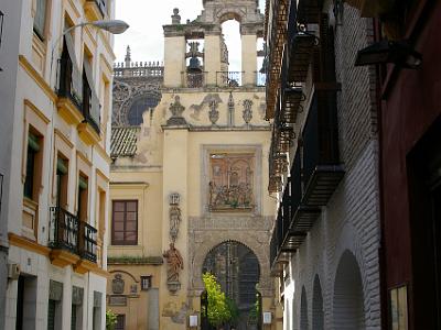 Sunday 26 March, 2006  This wierd, Moorish style arch is an entrance to the Cathedral. It is called the Puerta del Perdón y Patio de los Naranjos. The Patio of the Oranges is visible through the arch.