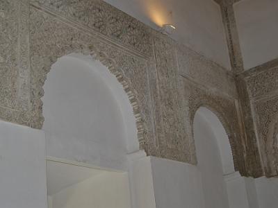 Sunday 26 March, 2006  The arabesques inside the palace follow the Mudejar style of the time.  The arabesque is an elaborative application of repeating geometric forms that often echo the forms of plants and animals.