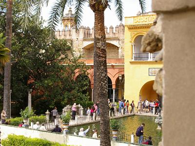 Sunday 26 March, 2006  At the far end of the wall.  The  yellow pavilion  gives access to the Palacio Gótico also known as the Halls of Charles V.