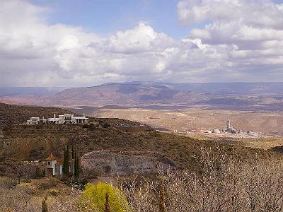 Friday 10 March, 2006  We're now in the old ghost town of Jerome, population 343. The mansion on the hill is the Douglas Mansion in Jerome State Historic Park with the Powder Box Church in the foreground.