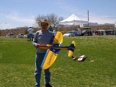 Tuesday 14 March, 2006  Me with my 8 year old, crashed twice, Thunderbird. There were over 90 entries in Classic and about the same in Old Time Stunt. This is the world's largest competition for these older planes.