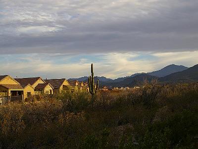 Tuesday 14 March, 2006  Sunset from Bill's back yard. Tucson is surrounded by very impressive mountains. Mount Lemon for example is 9150 feet. That's about 2000' taller than Mt Kosciusko, Australia's tallest hill.