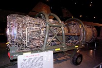 These bypass tubes can be seen behind the final turbine stage (where all of the tubing stops) running along the engine into the after-burner section.  Behind the engine sits the convergent/divergent ejectors as part of the airframe.  It was a conventional afterburning turbojet for take-off and acceleration to Mach 2 and then it used permanent compressor bleed to the afterburner above Mach 2 where it operated like a ramjet. : 2009-11-04 USA Air Force Museum