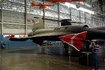 The YF-12 "Blackbird" was an experimental fighter-interceptor version of the Lockheed A-12 reconnaissance aircraft  but the YF-12 was never adopted by the military as an operational aircraft. It was, however, a precursor to the SR-71 Blackbird reconnaissance plane. Also, this plane had a vertical vertical fin underneath at the rear to increase stability ands ee how the tertiary doors at the rear of the engine are open? : 2009-11-04 USA Air Force Museum